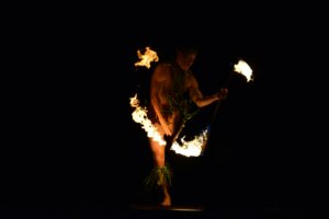 fire dancer in a hawaiian luau