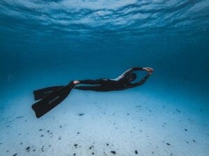 a man underwater snorkeling